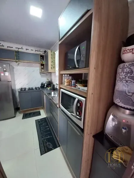 Casa 2 dormitórios de terreno inteiro em CAPÃO DA CANOA: 1ª foto da galeria de imagens do imóvel