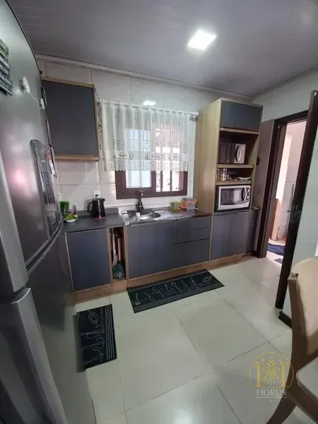 Casa 2 dormitórios de terreno inteiro em CAPÃO DA CANOA: 18ª foto da galeria de imagens do imóvel