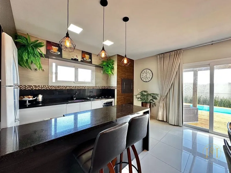 Casa sofisticada no Quintas do Lago com 3 suítes e piscina: 11ª foto da galeria de imagens do imóvel