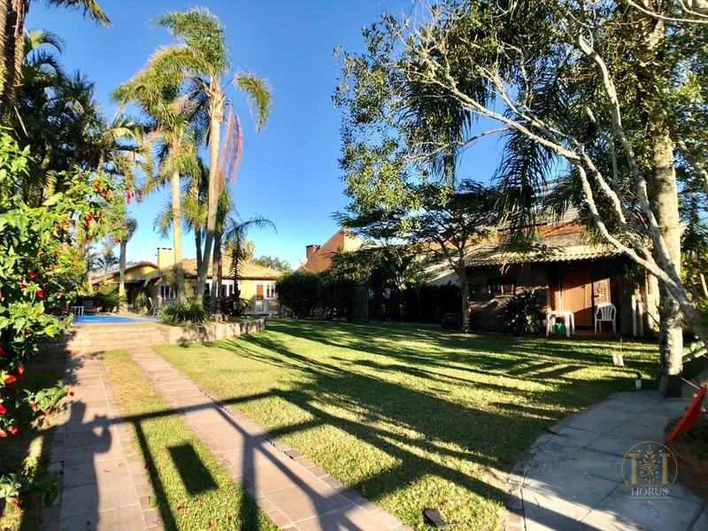 Inédita Casa com Dois Terrenos em Atlântida!: 30ª foto da galeria de imagens do imóvel