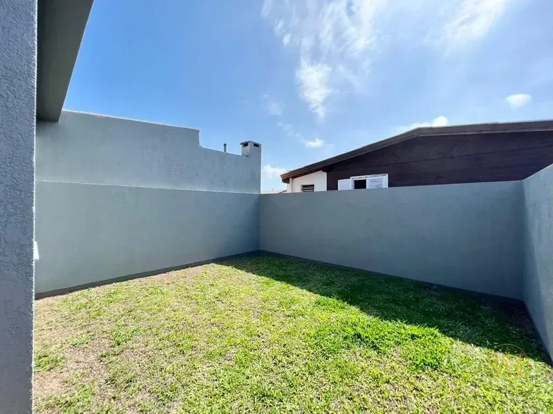 CASA GEMINADA PROXIMO AO CENTRO DE CAPÃO DA CANOA-RS: 3ª foto da galeria de imagens do imóvel