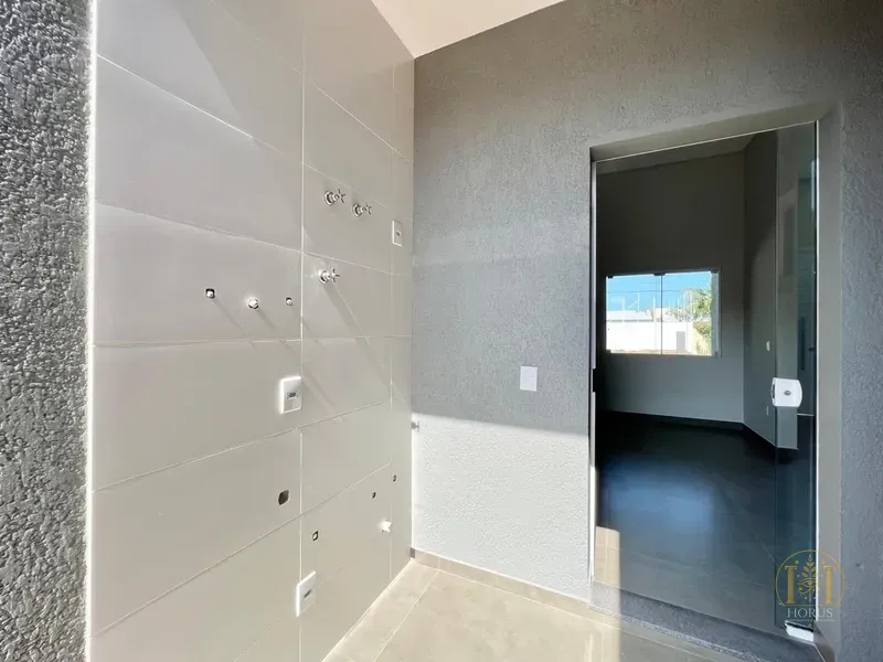 CASA GEMINADA PROXIMO AO CENTRO DE CAPÃO DA CANOA-RS: 2ª foto da galeria de imagens do imóvel