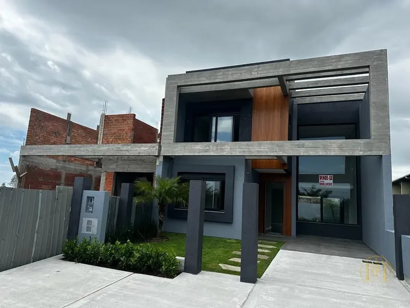 Sobrado novo a 100 metros do mar: 1ª foto da galeria de imagens do imóvel