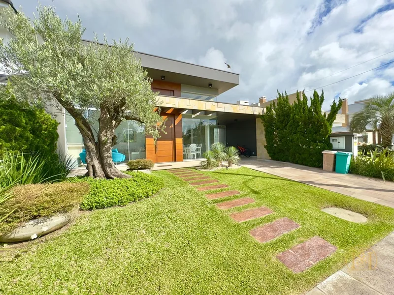 Casa sofisticada no Condomínio Fechado Condado: 3 suítes e piscina aqu: 3ª foto da galeria de imagens do imóvel