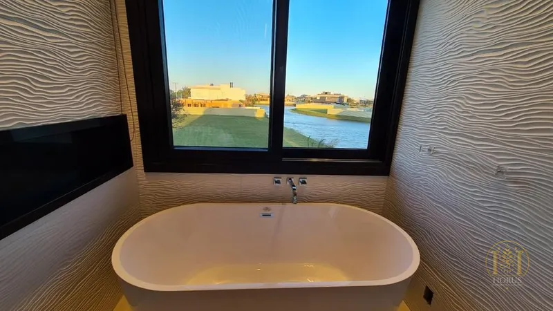 Mansão beira lago no condomínio Sense: 19ª foto da galeria de imagens do imóvel