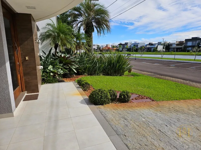 Linda casa de frente para o lago em Xangri-lá: 2ª foto da galeria de imagens do imóvel