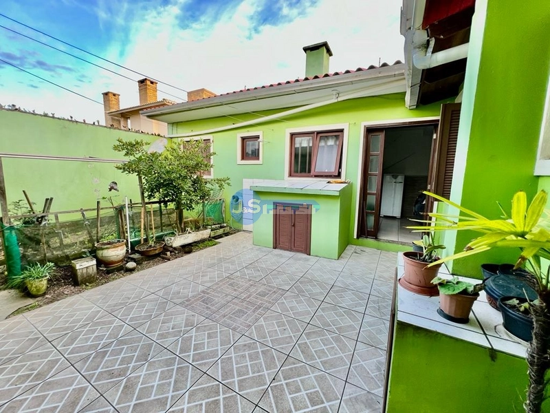 Casa em Atlântida Sul: 2ª foto da galeria de imagens do imóvel