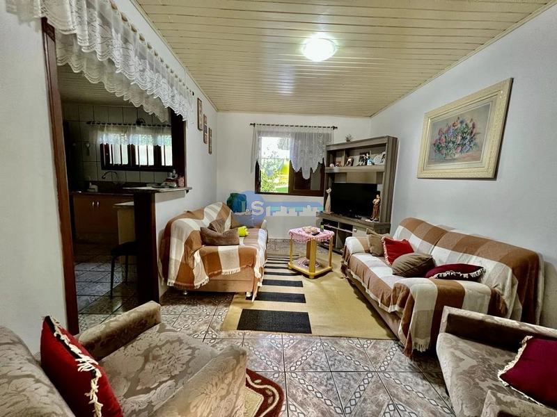 Casa em Atlântida Sul: 4ª foto da galeria de imagens do imóvel