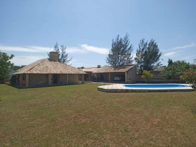 Casa de praia com 03 terrenos: 20ª foto da galeria de imagens do imóvel