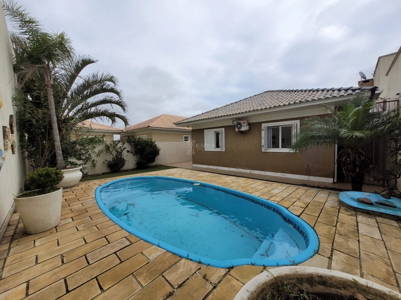 EXCELENTE CASA COM PISCINA: 5ª foto da galeria de imagens do imóvel