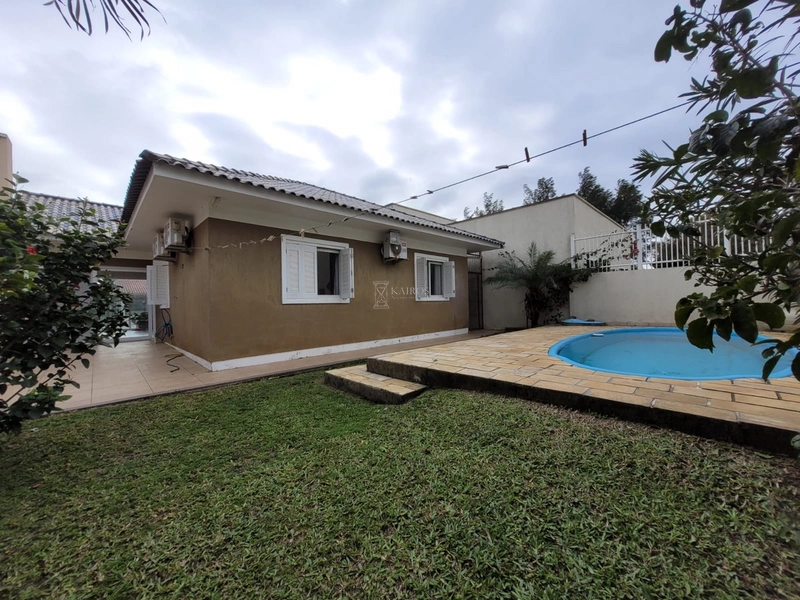 EXCELENTE CASA COM PISCINA: 3ª foto da galeria de imagens do imóvel