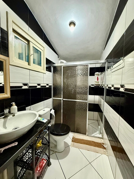 EXCELENTE CASA DE PRAIA PRÓXIMA AO MAR COM PISCINA: 31ª foto da galeria de imagens do imóvel