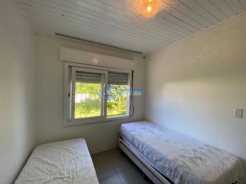 Casa em Atlântida Sul: 4ª foto da galeria de imagens do imóvel