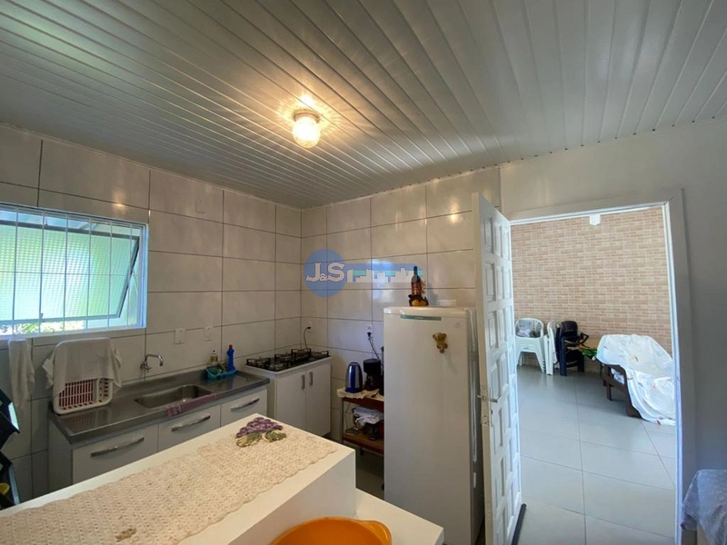 Casa em Atlântida Sul: 2ª foto da galeria de imagens do imóvel