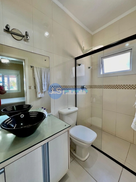 Casa em Atlântida Sul: 2ª foto da galeria de imagens do imóvel