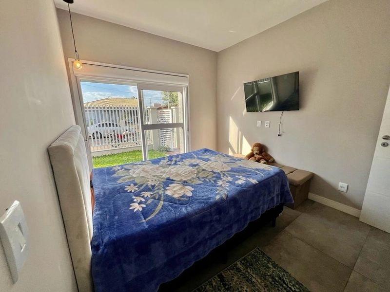 CASA TÉRREA TRÊS DORMITÓRIOS EM CAPÃO DA CANOA: 12ª foto da galeria de imagens do imóvel