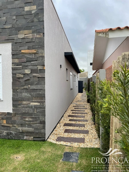 Casa térrea 4 suítes, no Centro de Xangri-lá: 5ª foto da galeria de imagens do imóvel