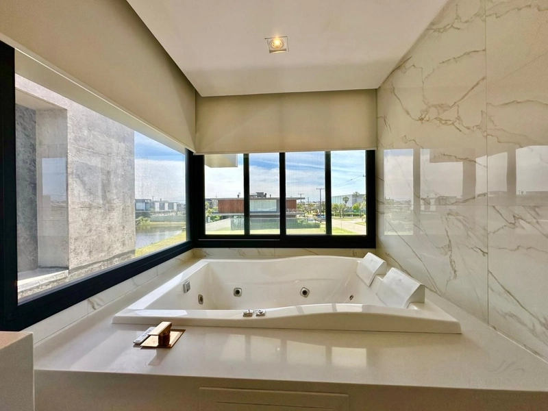 Sobrado com 5 suites, 494 m² de área privativa, Centro Xangri-lá/RS: 32ª foto da galeria de imagens do imóvel