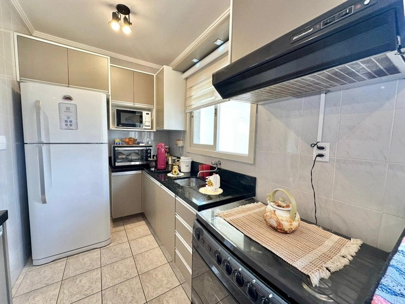 APARTAMENTO 02 DORMITÓRIOS FRENTE PRAÇA - CAPÃO DA CANOA: 4ª foto da galeria de imagens do imóvel