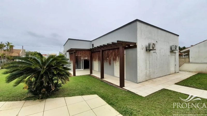 Casa  4 dormitórios em Xangri lá: 4ª foto da galeria de imagens do imóvel