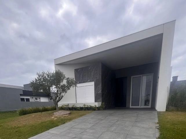Casa Térrea  04 dormitórios Condomínio Terrasul em Capão da Canoa: 1ª foto da galeria de imagens do imóvel