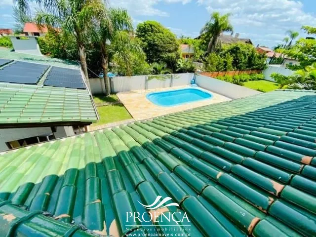 Sobrado 4 dormitórios com piscina em Atlântida: 4ª foto da galeria de imagens do imóvel