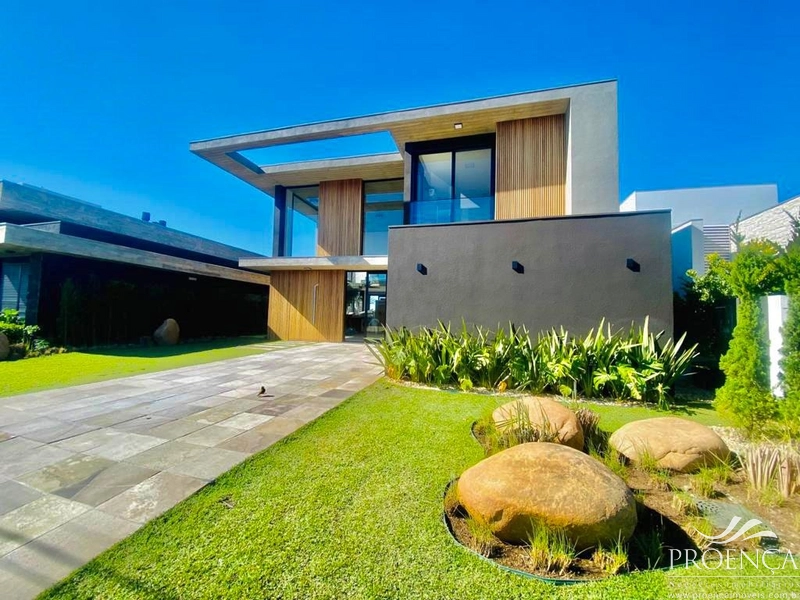 Casa Condomínio Fechado 5 suítes, Área verde e Beira Lago, Xangrilá.: 1ª foto da galeria de imagens do imóvel