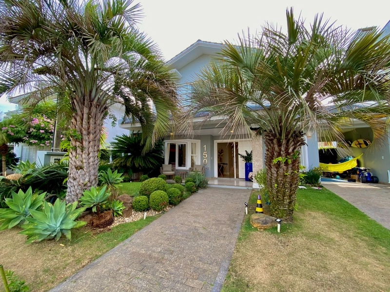 Casa 4 Dormitórios com piscina ( Condado de Capão ): 1ª foto da galeria de imagens do imóvel