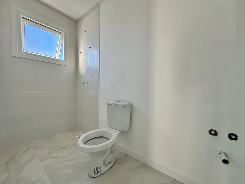 Apartamento de dois dormitórios sendo um suíte. centro/Capão da Canoa.: 3ª foto da galeria de imagens do imóvel