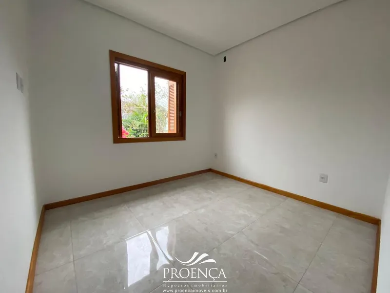 Casa 4 dormitórios em excelente localização em Capão da Canoa: 3ª foto da galeria de imagens do imóvel
