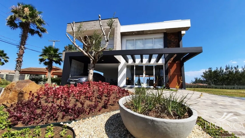 Casa 4 dormitórios no Condomínio, Maristela em Xangri-lá.: 1ª foto da galeria de imagens do imóvel