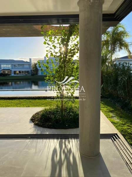 Casa Punta Beira Lago, 4 suítes + dependência, 356m².: 5ª foto da galeria de imagens do imóvel