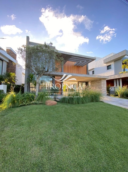 Casa Punta Beira Lago, 4 suítes + dependência, 356m².: 2ª foto da galeria de imagens do imóvel