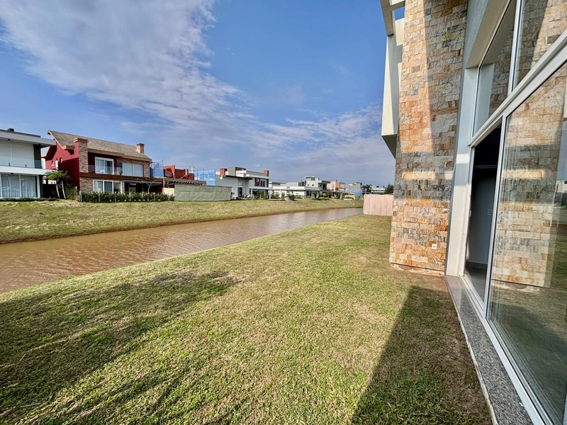 Casa Térrea 4 suítes beira lago-Cond Capão Ilhas Resort-Capão da Canoa: 11ª foto da galeria de imagens do imóvel
