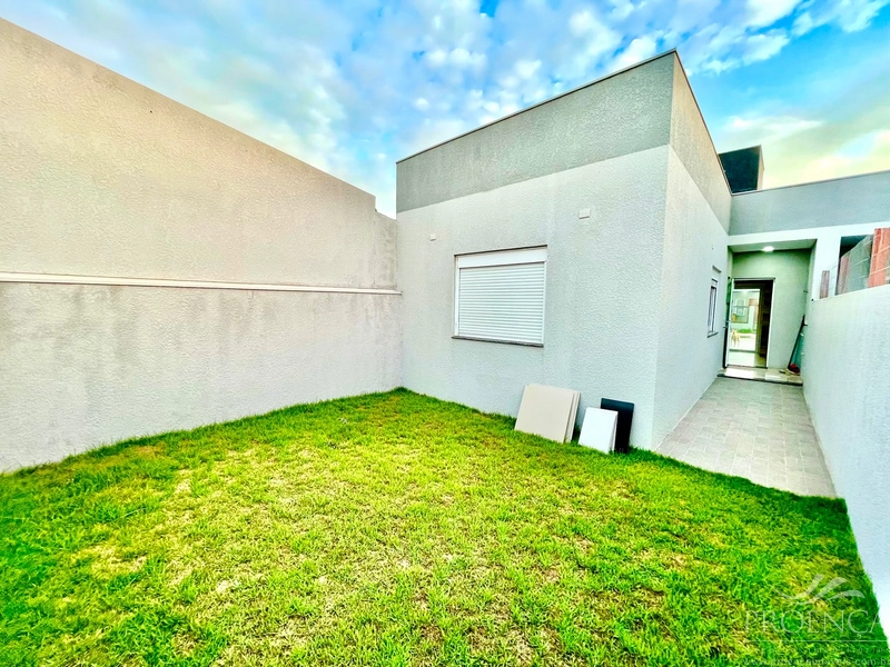 Linda casa geminada: 1ª foto da galeria de imagens do imóvel