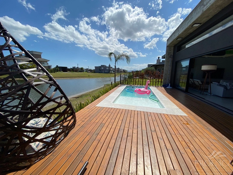 Condomínio Riviera em Xangri-lá casa 4 suítes a venda Beira Lago!: 4ª foto da galeria de imagens do imóvel