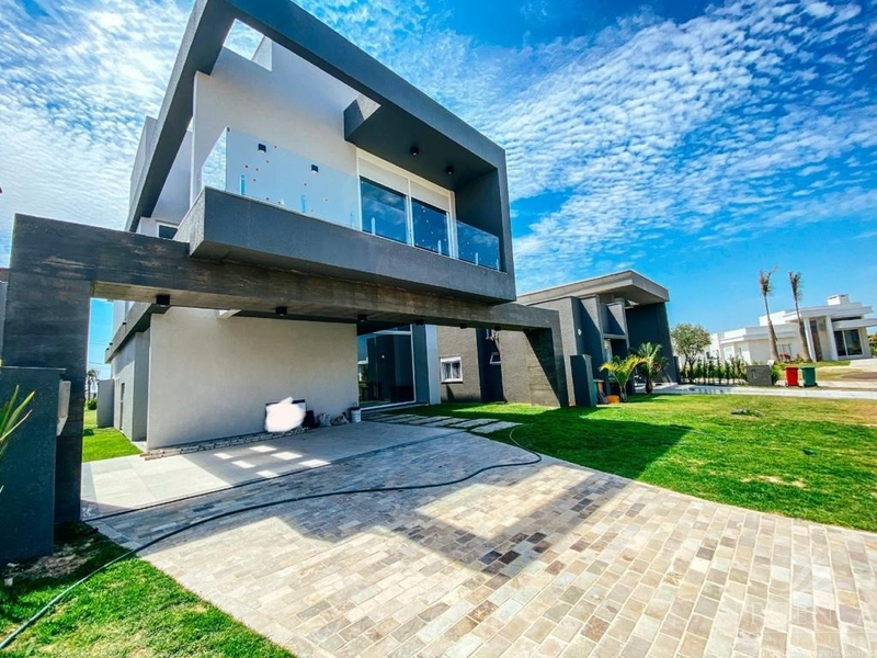 Casas à venda em Xangri-Lá, Condomínio Riviera.: 1ª foto da galeria de imagens do imóvel