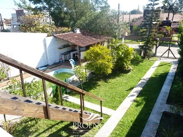 Casa a venda 03 dormitórios com piscina em Capão da Canoa: 1ª foto da galeria de imagens do imóvel