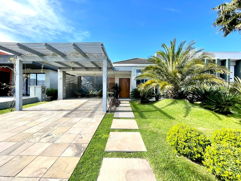 Excelente casa Terreá composta de 3 suítes,Lindo Paisagismo.: 1ª foto da galeria de imagens do imóvel
