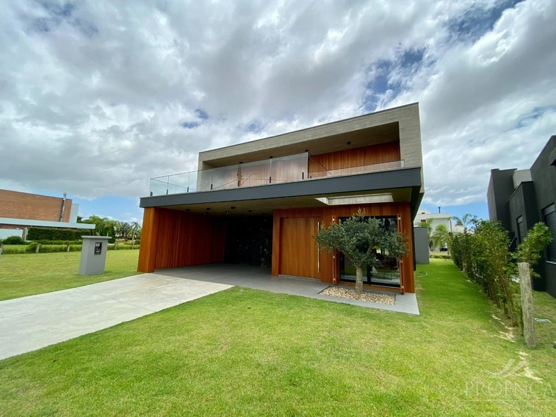 Casa com 5 Suítes em condomínio fechado de Xangri-lá!: 1ª foto da galeria de imagens do imóvel