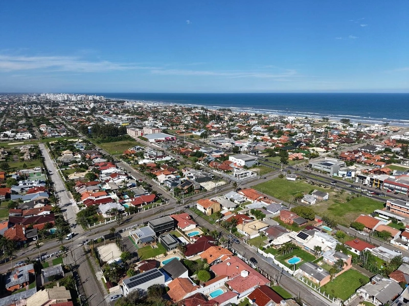 CASA TÉRREA NO CENTRO DE XANGRI-LÁ, FRENTE LESTE, DIVISA COM ATLÂNTIDA: 4ª foto da galeria de imagens do imóvel