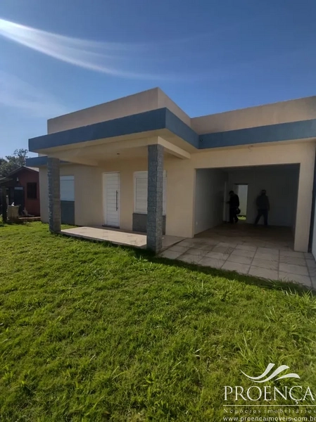 Casa com 2 dormitórios próximo ao mar em Capão da Canoa: 2ª foto da galeria de imagens do imóvel