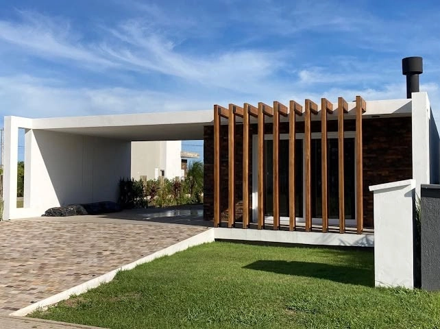 Casa Térrea  04 dormitórios Condomínio Terrasul em Capão da Canoa: 1ª foto da galeria de imagens do imóvel