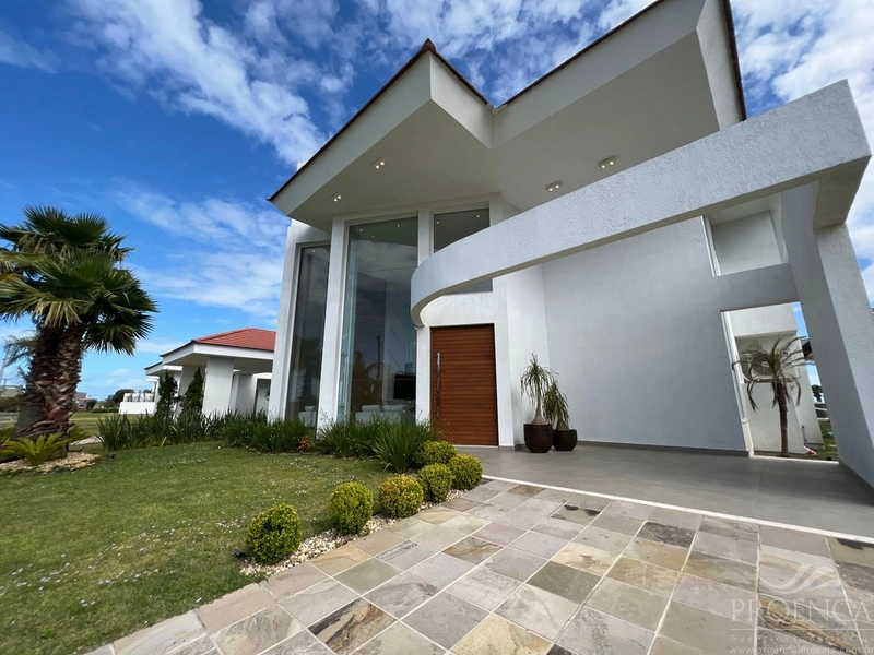 Casa em Condomínio 4 dormitórios, Remanso em Xangri-lá.: 1ª foto da galeria de imagens do imóvel