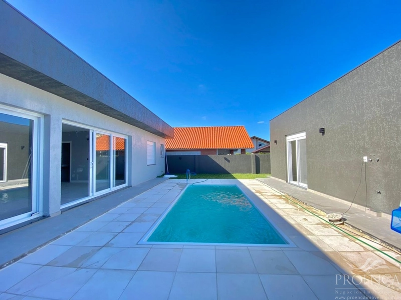 Casa térrea 5 suítes no Centro de Atlântida: 7ª foto da galeria de imagens do imóvel