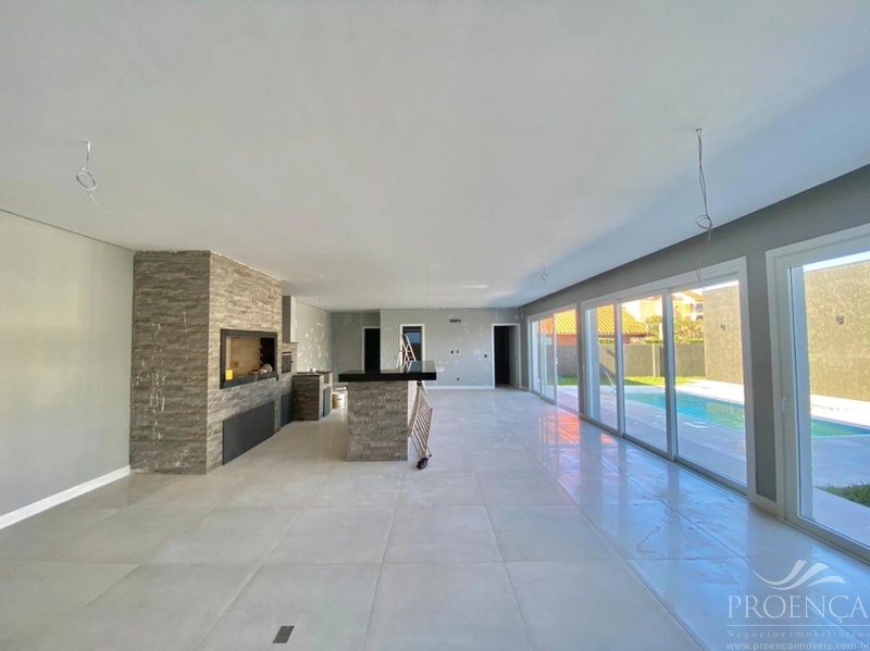 Casa térrea 5 suítes no Centro de Atlântida: 10ª foto da galeria de imagens do imóvel