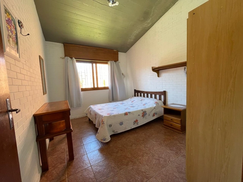 Casa 5 dormitórios no bairro Atlântida Xangrila: 26ª foto da galeria de imagens do imóvel