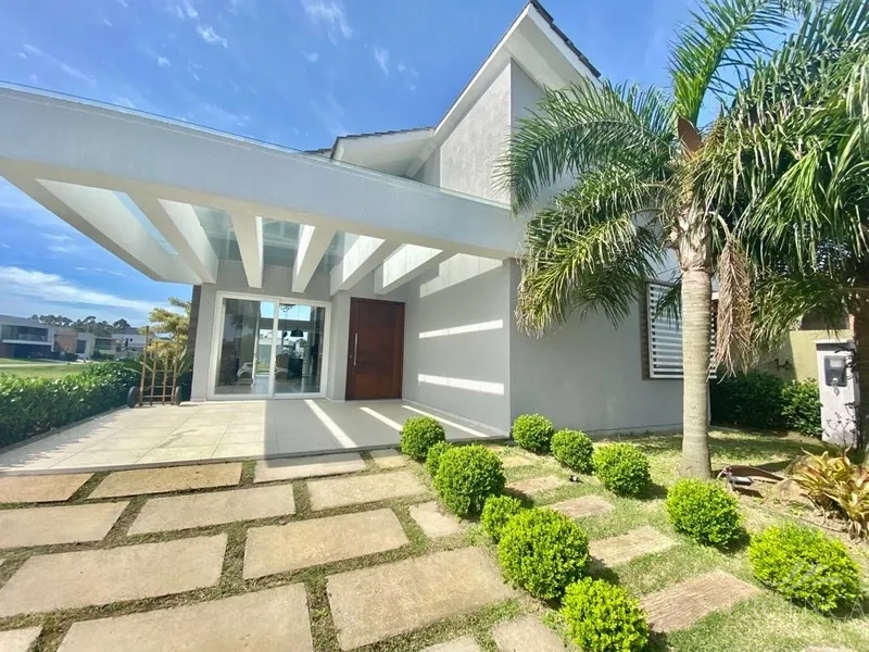 Casa Térrea 4 suítes Beira Lago- Cond Capão Ilhas - Capão da Canoa: 1ª foto da galeria de imagens do imóvel