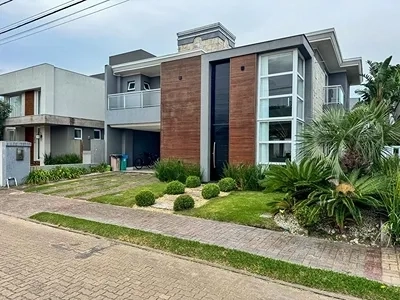 Excelente sobrado no condomínio Sea Coast: 1ª foto da galeria de imagens do imóvel