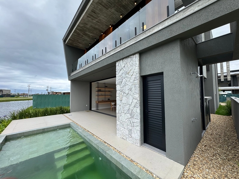 Sobrado com arquitetura uníca, no Condiminio Zen em Xangri-Lá.: 11ª foto da galeria de imagens do imóvel